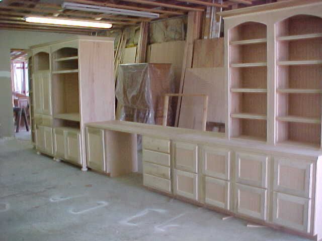 Custom Designed Long Wall Entertainment Center.A Ton of Media Storage here.Solid Maple .Premium Quality.