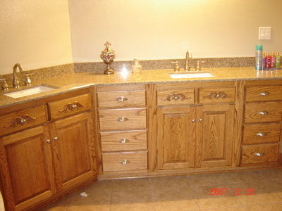 Solid wood bathroom vanity with Granite tops.
